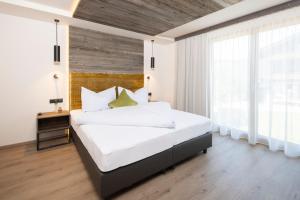 Postel nebo postele na pokoji v ubytování Stocker´s Wohlfühlapartments