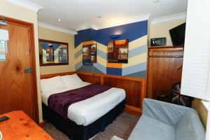 TV a/nebo společenská místnost v ubytování KX Rooms Kings Cross