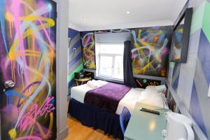 Postel nebo postele na pokoji v ubytování KX Rooms Kings Cross