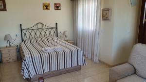 Postel nebo postele na pokoji v ubytování Vera Rental Torremar Natura + 37 fotografií