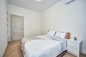 Krevet ili kreveti u jedinici u objektu SEA, central ARCADIA, lux 3 room apartment