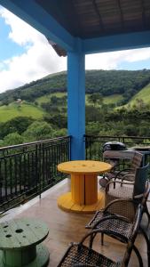 Een balkon of terras bij Casa de campo Recanto Pedra Azul