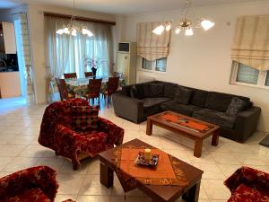 A seating area at beautiful apartment near the beach