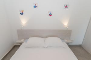 Posteľ alebo postele v izbe v ubytovaní Apartments Keran