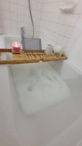 Koupelna v ubytování Appart'Hotel Lizon Cocooning avec sauna