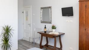 TV a/nebo společenská místnost v ubytování Hotel Villa Bonelli