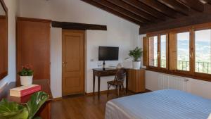 Postel nebo postele na pokoji v ubytování Hotel Villa Bonelli