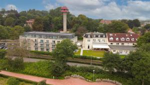 a building with a tower in the middle of a city at Villa Beachside in Eckernförde