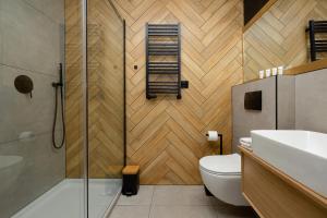 Kúpeľňa v ubytovaní Etna Apartments Kołobrzeg by Noclegi Renters + 37 fotografií