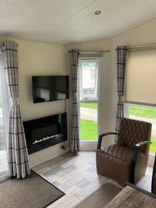 TV/trung tâm giải trí tại RBR 722 - Beach Resort Kamperland