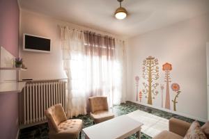 A television and/or entertainment centre at SUITE MORGANA in San Zeno