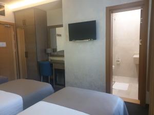 Standardna soba Zlatibor centar 205客房内的一张或多张床位
