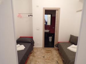 Koupelna v ubytování NUOVA AURORA Rent Rooms + 37 fotografií