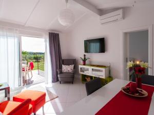 Posezení v ubytování Sun Garden Premium Apartments