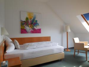 Postel nebo postele na pokoji v ubytování Hotel Schober