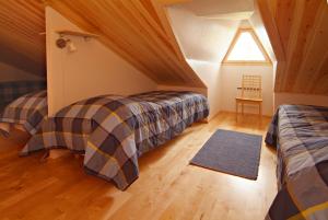 Postel nebo postele na pokoji v ubytování Polar Star Origo Apartments