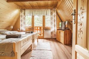 Posteľ alebo postele v izbe v ubytovaní Domek na Stromej
