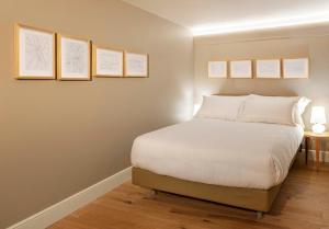 Łóżko lub łóżka w pokoju w obiekcie BSJ15-Borgo San Jacopo Room