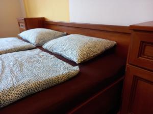 Postel nebo postele na pokoji v ubytování Penzion U školy + 37 fotografií