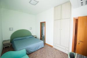 Postel nebo postele na pokoji v ubytování Alba Hotel