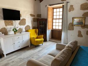 TV a/nebo společenská místnost v ubytování Casa La Tosca