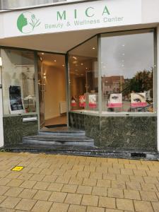 a store front of a beauty and wellness center at Mica beauty & wellness center in Temse