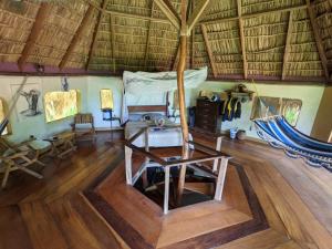 an overhead view of a room with a bed and wooden floors at Finca del Sol Eco Lodge in Santa Cruz
