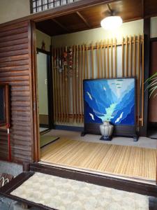 Postel nebo postele na pokoji v ubytování Ryokan Uemura