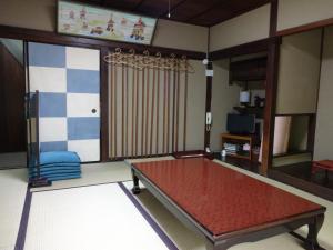 Postel nebo postele na pokoji v ubytování Ryokan Uemura