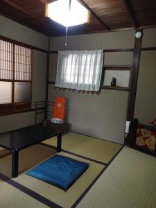 Postel nebo postele na pokoji v ubytování Ryokan Uemura