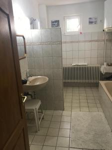 Kúpeľňa v ubytovaní Hív-Lak Apartman