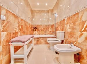 Kúpeľňa v ubytovaní Aromas Suites Apartments