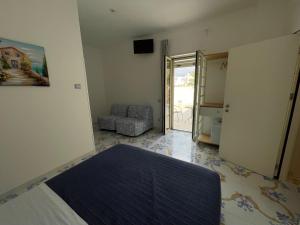 Postel nebo postele na pokoji v ubytování Acquadamare B&B