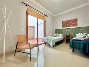 Posteľ alebo postele v izbe v ubytovaní Aromas Suites Apartments