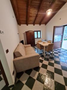 a living room with a couch and a table at Borgo Donna Teresa in Castel San Vincenzo +30 photos