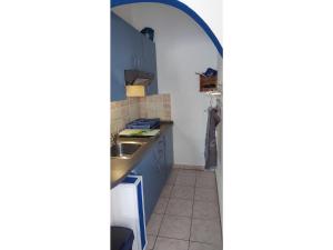 Kuchyň nebo kuchyňský kout v ubytování Blue Sea Vir Apartments