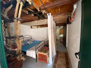a room with two bunk beds in a house at Holiday home Stiniva in Vis
