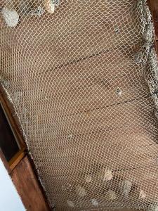 a metal staircase with dirt on it next to a window at Holiday home Stiniva in Vis