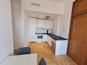 Kuchyňa alebo kuchynka v ubytovaní Cinque Giornate Charme Apartment