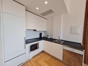 Kuchyňa alebo kuchynka v ubytovaní Cinque Giornate Charme Apartment