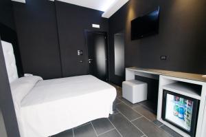 Posteľ alebo postele v izbe v ubytovaní Fly Boutique Hotel