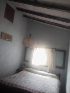 
Una cama o camas en una habitación de Mamacha Tatai
