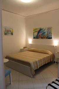 Ένα ή περισσότερα κρεβάτια σε δωμάτιο στο Marianna Quiet Rooms