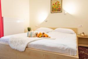 Voodi või voodid majutusasutuse Hotel Jakec Trije kralji na Pohorju toas