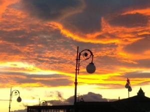 The sunrise or sunset as seen from a panziókat or nearby