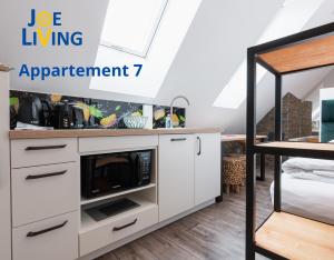 
A kitchen or kitchenette at Living inStein
