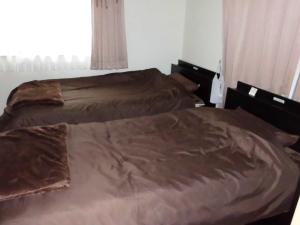 מיטה או מיטות בחדר ב-Private House Mariage maison