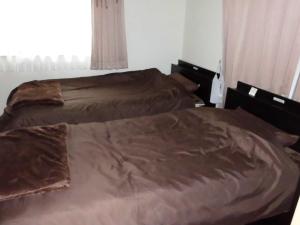 Voodi või voodid majutusasutuse Private House Mariage maison toas