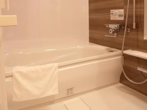 Koupelna v ubytování Hotel Rakurakuan