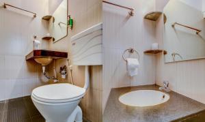 Koupelna v ubytování Treebo Iris Suites